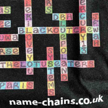 Image of Liverpool Bands name-chains black t-shirt - close upon bottom right showing name-chains logo